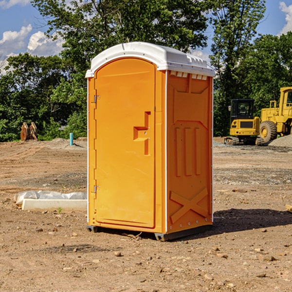 how often are the portable restrooms cleaned and serviced during a rental period in Wright County